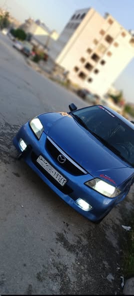 مازدا 323 2003 - صورة 1