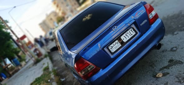 مازدا 323 2003 - صورة 2