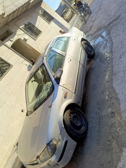مازدا 323 2005 - صورة 2