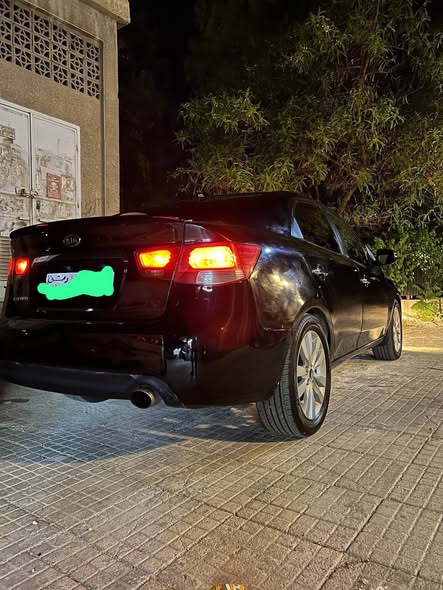 كيا فورتي 2011 - صورة 4