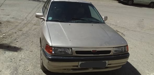 مازدا 323 1993 - صورة 3