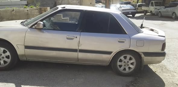مازدا 323 1993 - صورة 4
