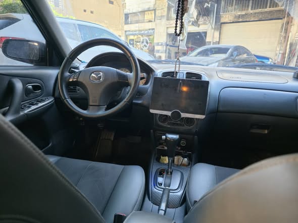 مازدا 323 2004 - صورة 2
