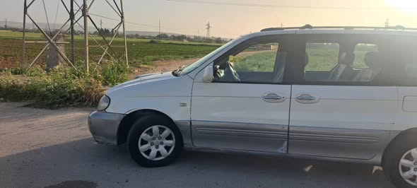 كيا كرنفال 2003 - صورة 1