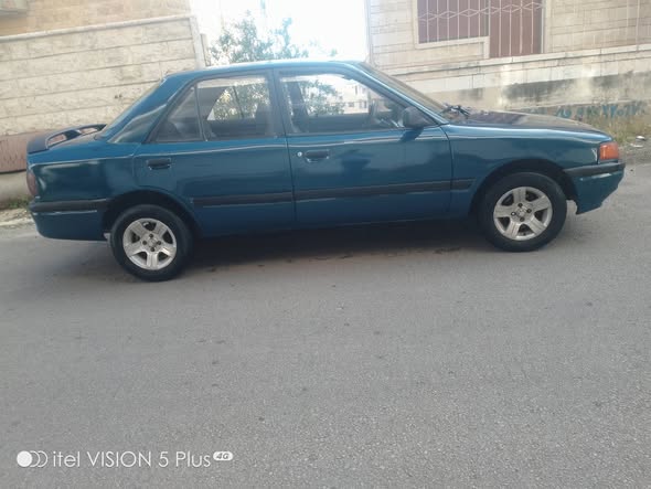 مازدا 323 1993 - صورة 1