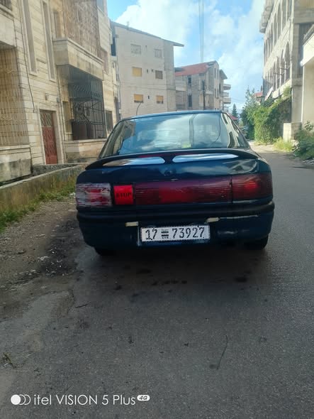مازدا 323 1993 - صورة 2