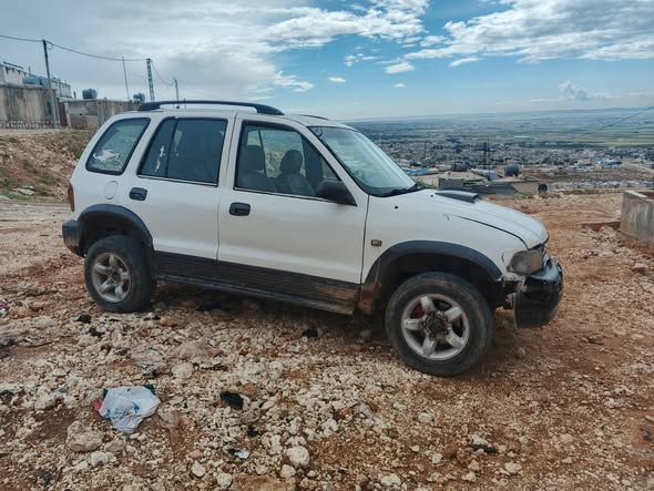 كيا سبورتاج 2002 - صورة 4