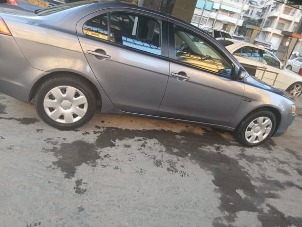 متسوبيشي لانسر 2008 - صورة 5