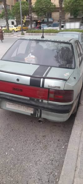 مازدا 323 1993 - صورة 3