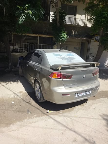 ميتسوبيشي لانسر 2010 - صورة 1