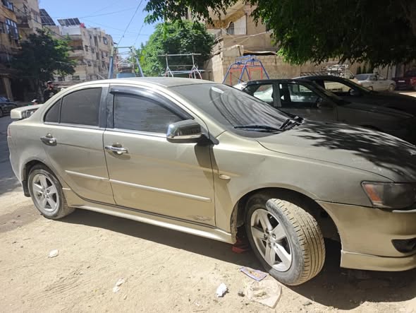 ميتسوبيشي لانسر 2010 - صورة 3