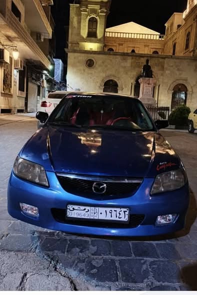 مازدا 323 2003 - صورة 1