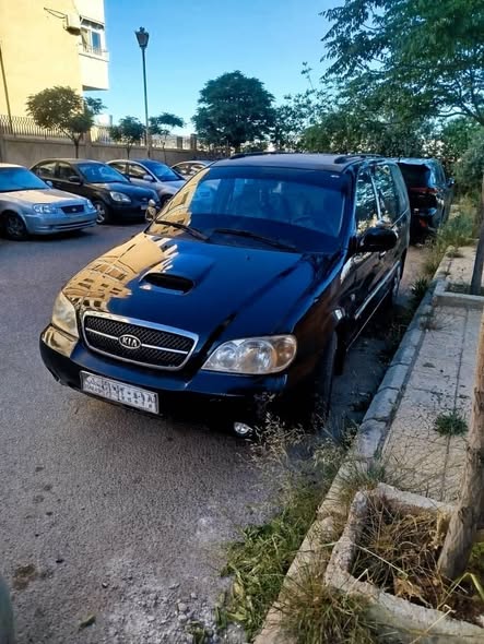 كيا كرنفال 2004 - صورة 1