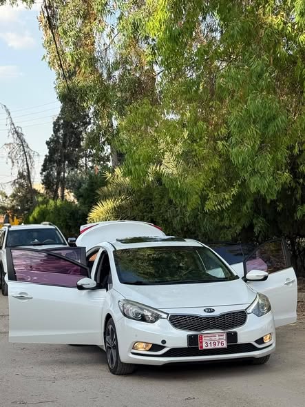 كيا سيراتو 2013 - صورة 5