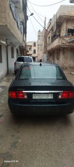 كيا اوبتيما 2001 - صورة 2