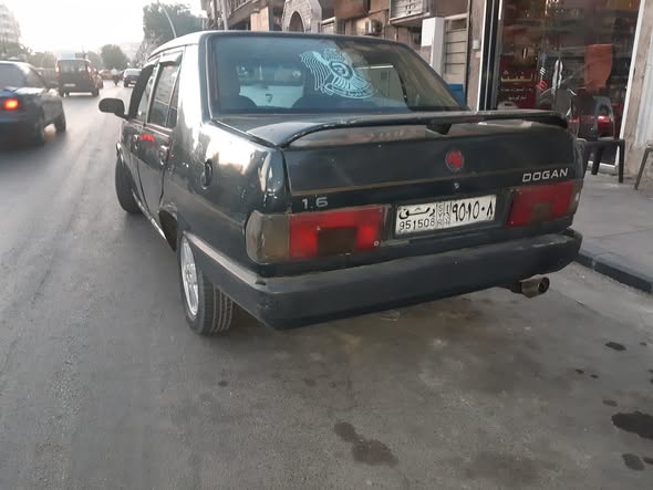 توفاش دوغان 2003 - صورة 3