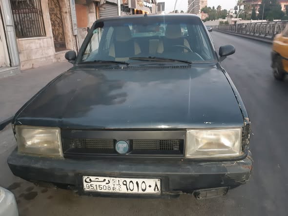 توفاش دوغان 2003 - صورة 5
