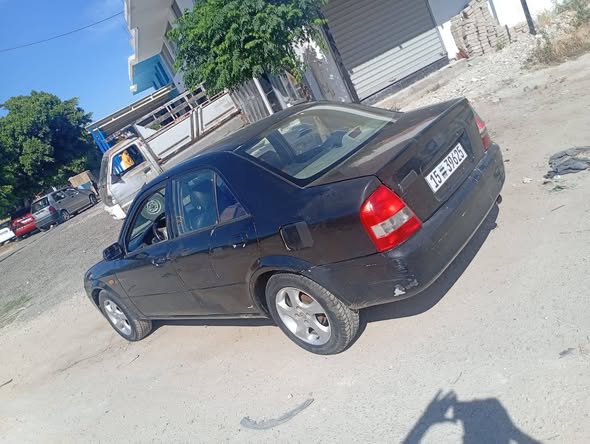 مازدا 323 2003 - صورة 1