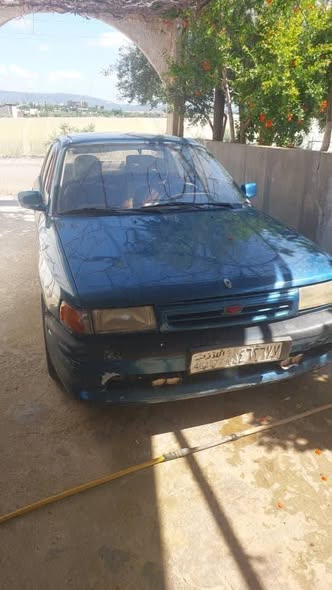 مازدا 323 1993 - صورة 1