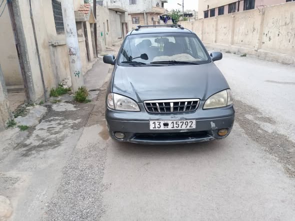 كيا كارنز 2002 - صورة 1