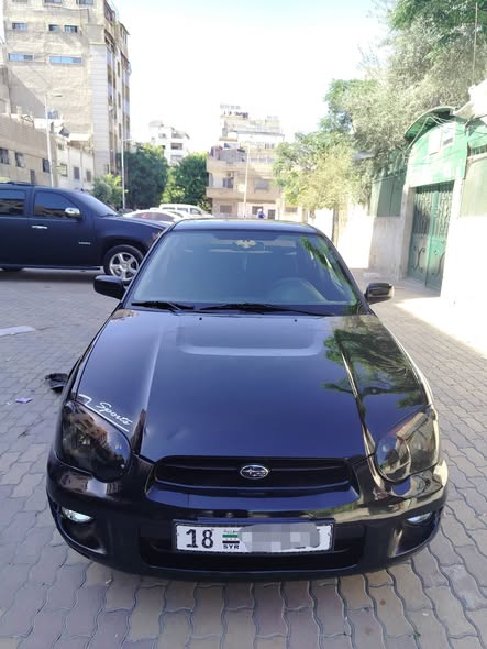سوبارو امبريزا 2004 - صورة 1