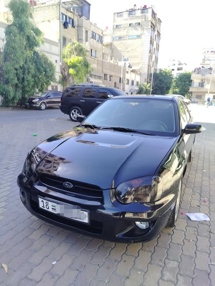 سوبارو امبريزا 2004 - صورة 2