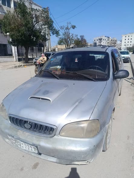 كيا كرنفال 2001 - صورة 3