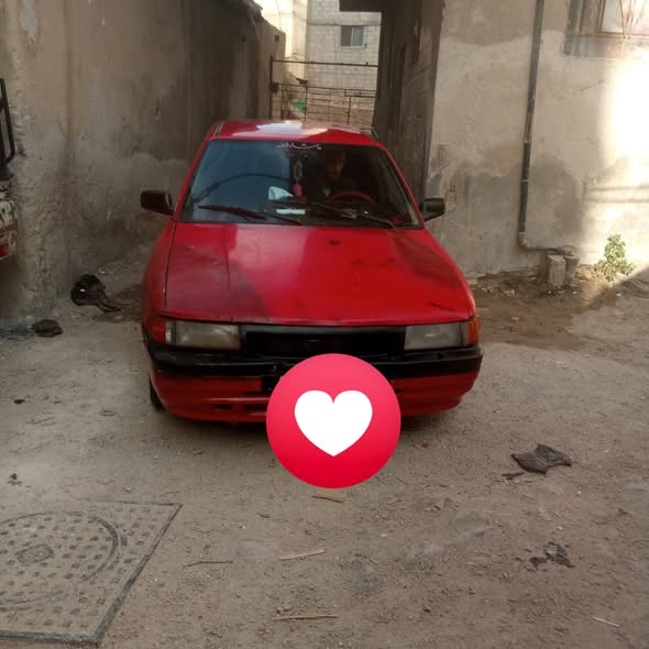 مازدا 323 1992 - صورة 1