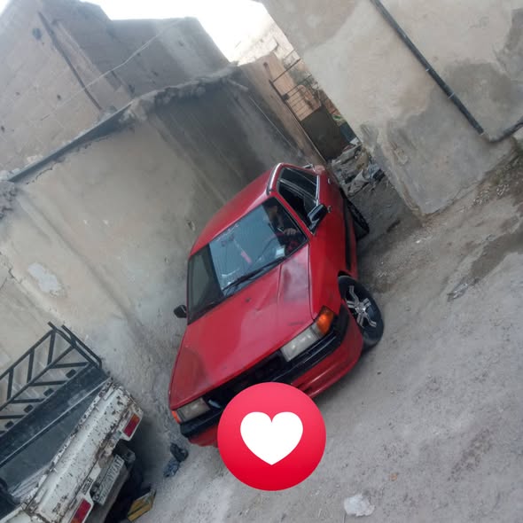 مازدا 323 1992 - صورة 3
