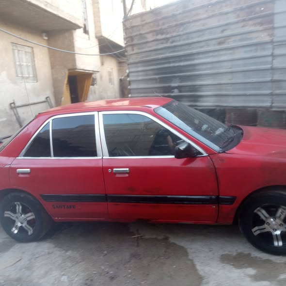 مازدا 323 1992 - صورة 4