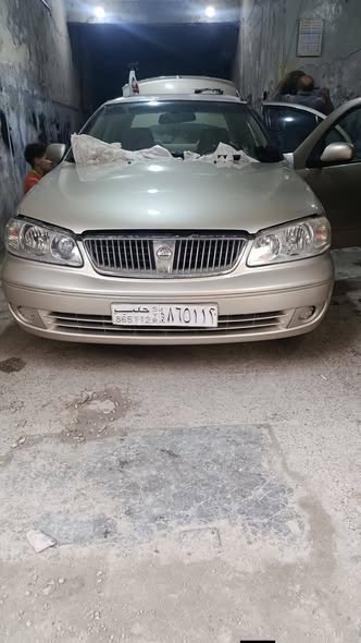 نيسان صني 2003 - صورة 1