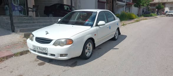 كيا شوما 2003 - صورة 4