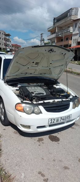 كيا شوما 2003 - صورة 5