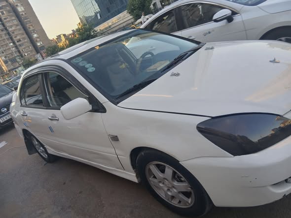 متسوبيشي لانسر 2006 - صورة 5