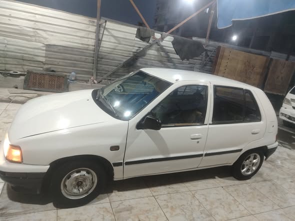دايهاتسو شاريد 1993 - صورة 3