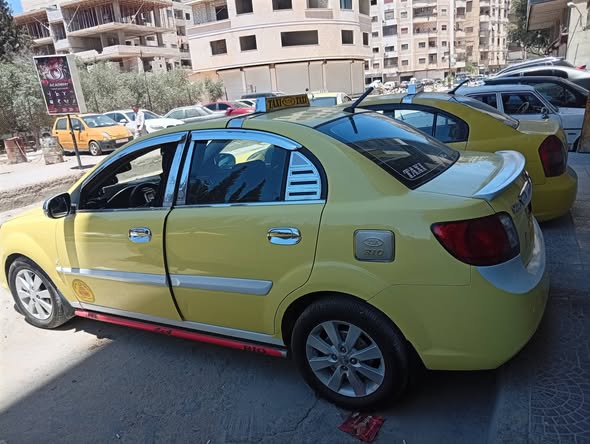كيا ريو 2011 - صورة 4