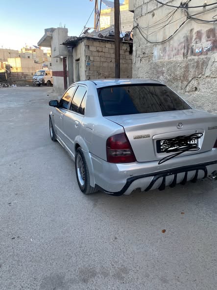 مازدا 323 2002 - صورة 2