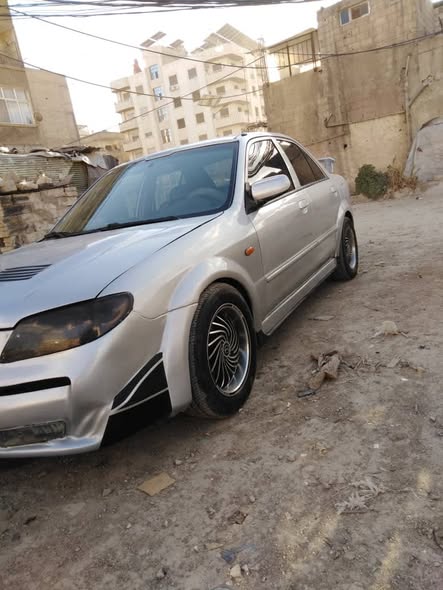 مازدا 323 2002 - صورة 3
