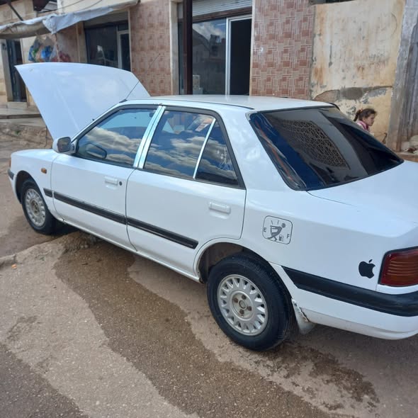 مازدا 323 1993 - صورة 2