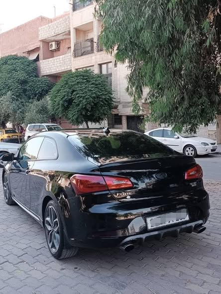 كيا فورتي 2015 - صورة 5