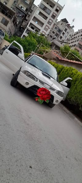 بروتون ويرا 2004 - صورة 1