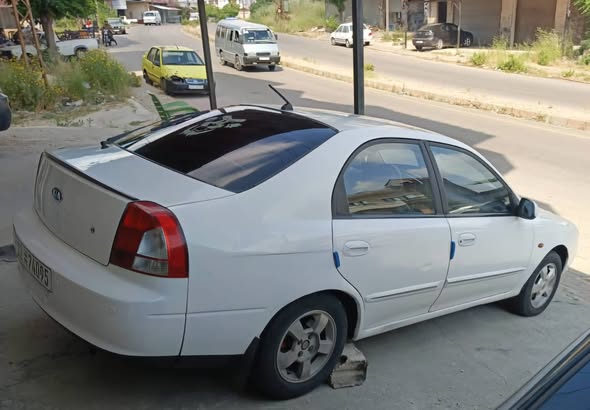 كيا شوما 2003 - صورة 4