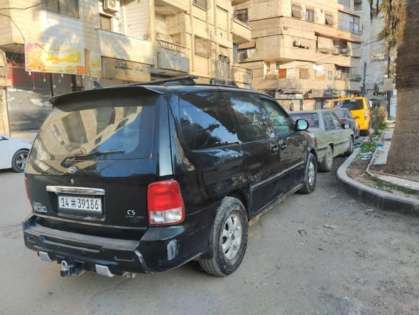 كيا كرنفال 2003 - صورة 3