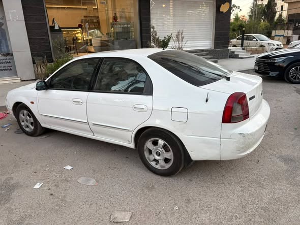 كيا شوما 2002 - صورة 4