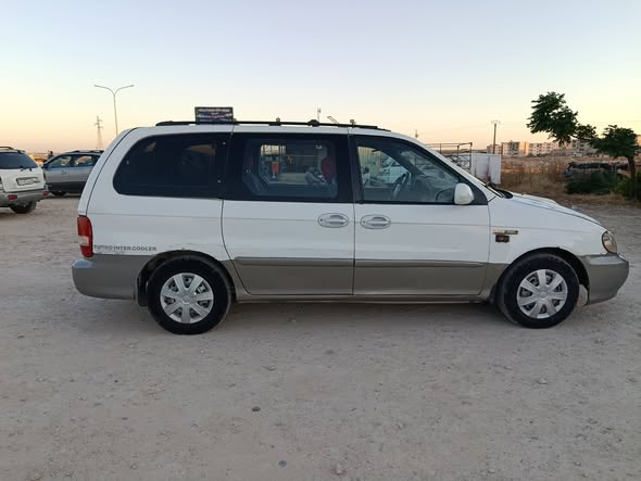 كيا كرنفال 2002 - صورة 1