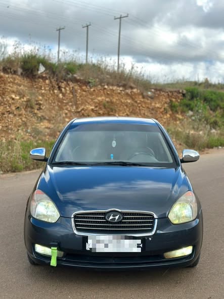 هيونداي اكسنت 2010 - صورة 1