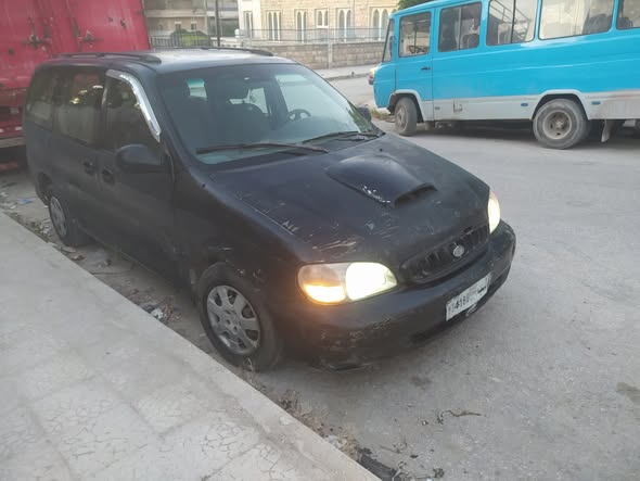 كيا كرنفال 2000 - صورة 1