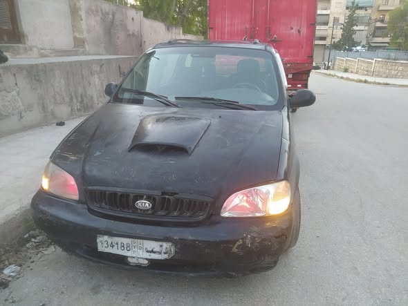 كيا كرنفال 2000 - صورة 5