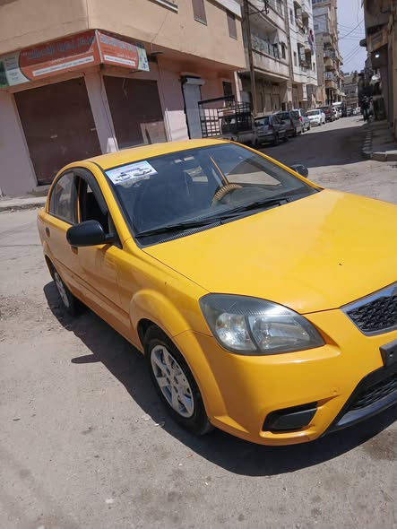 كيا ريو 2011 - صورة 2