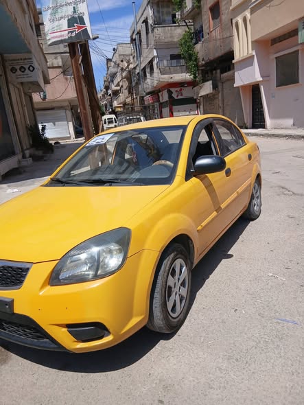 كيا ريو 2011 - صورة 3